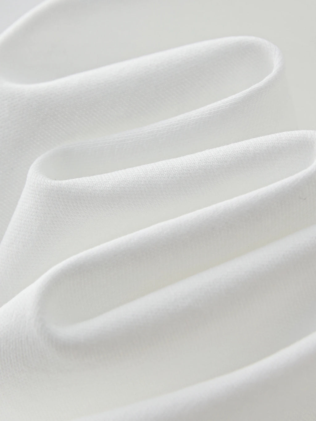 FSLE 【Premium Series】Design-inspired Asymmetric Twisted Pleated Solid Color Short-sleeved T-shirt for Women 25FE12021