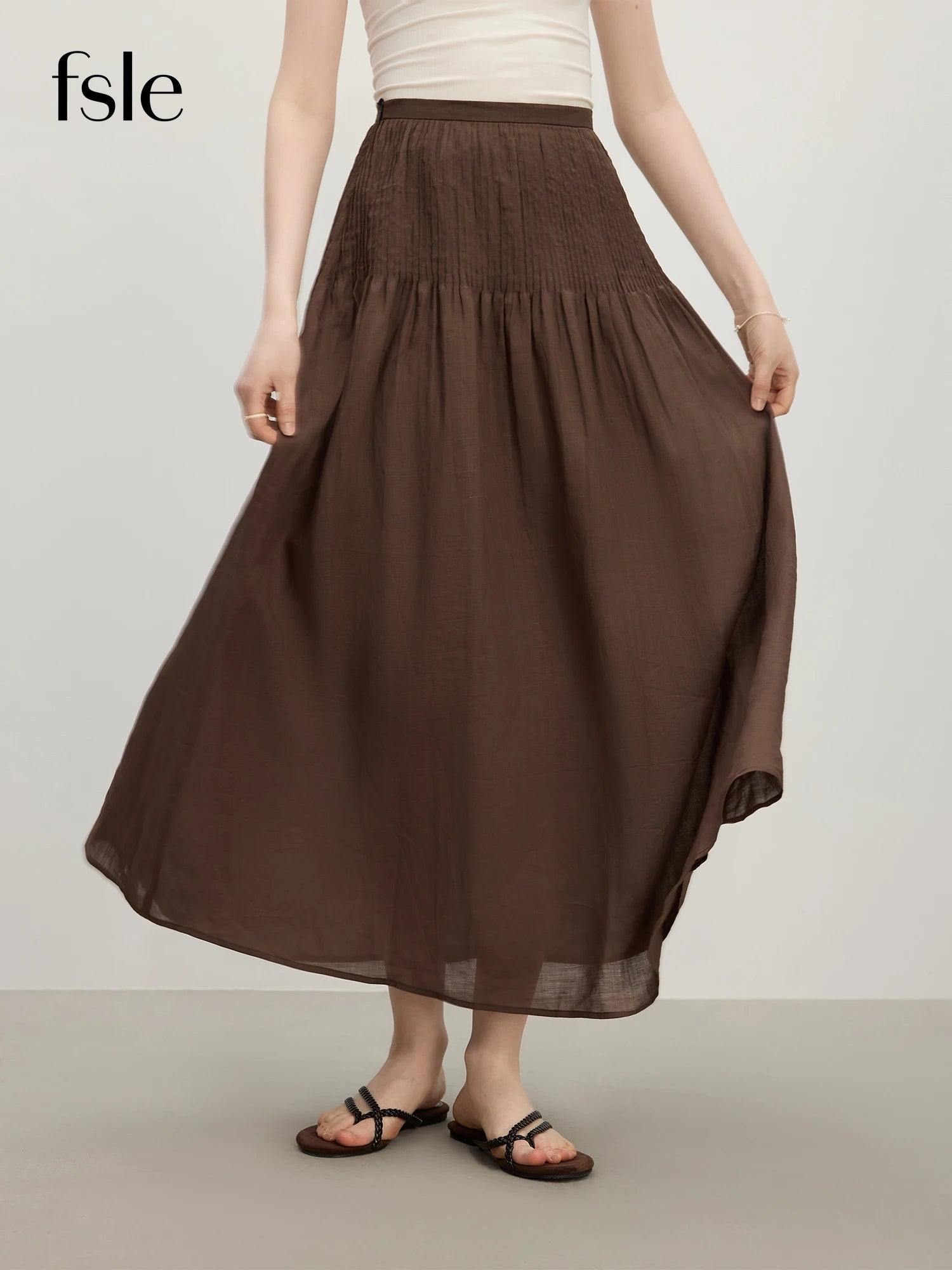 FSLE 2025 Saia feminina de verão estruturada Tuck cintura alta evasê – bainha queimada e tecido leve para elegância emagrecedora