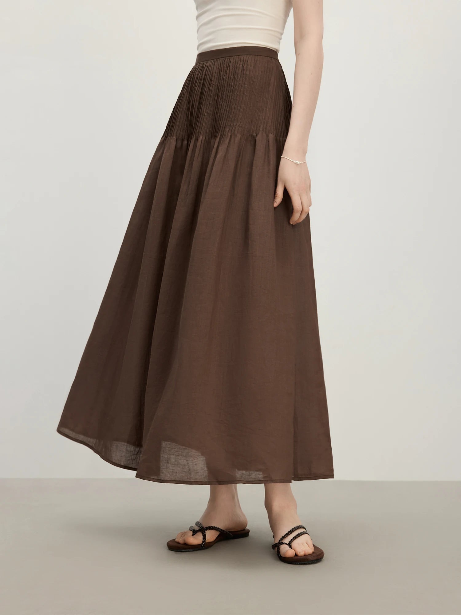 FSLE 2025 Saia feminina de verão estruturada Tuck cintura alta evasê – bainha queimada e tecido leve para elegância emagrecedora